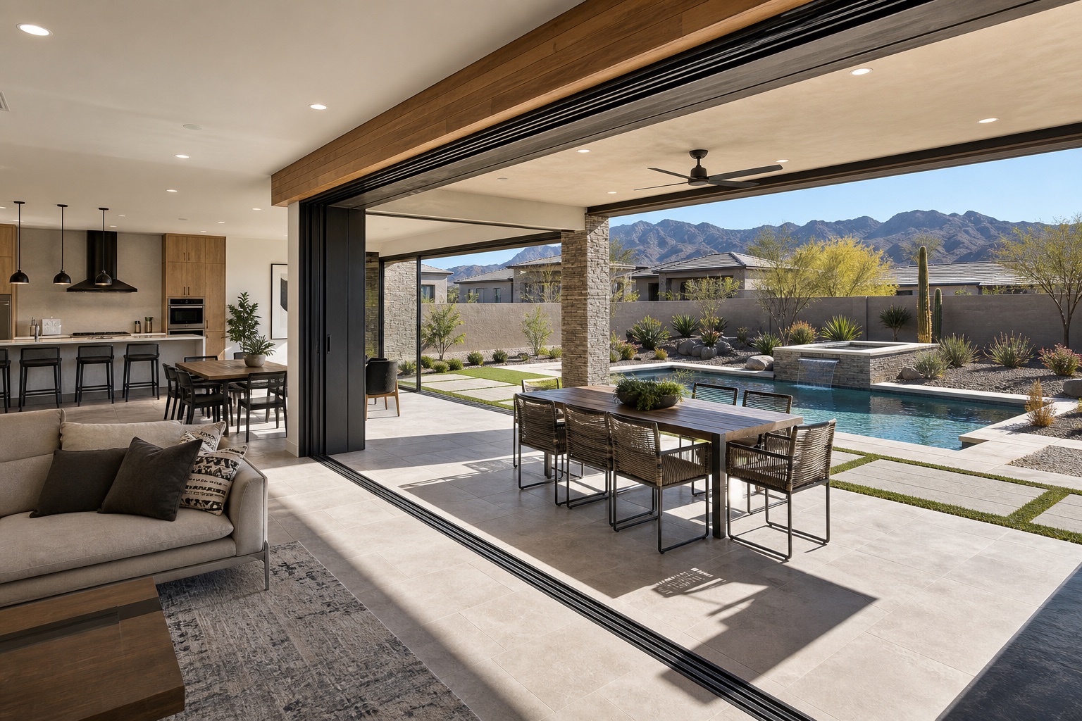 Panoramic door wall opening to a Las Vegas backyard